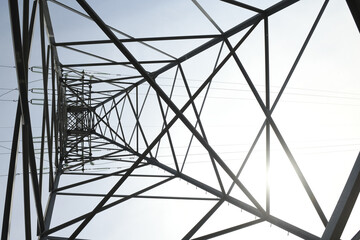 Directly Below Of Electricity Pylon Against Sky 