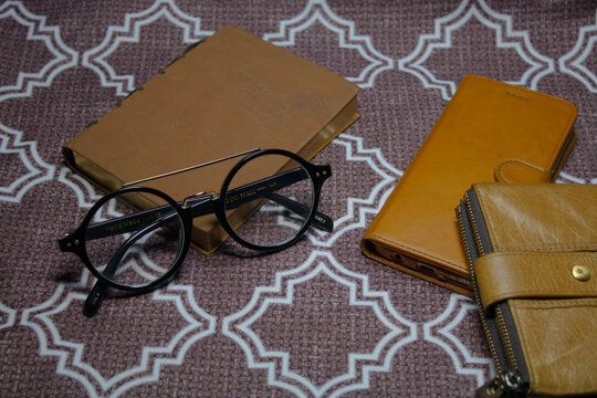 old glasses and book