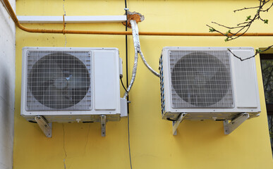 Air conditioning outside the building. Air ventilation system in the house. Climatic equipment....