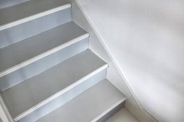 Fototapeta premium Stairs leading upstairs in a house