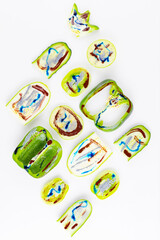 Collection of green vegetables and fruits on a white background. Vegetable pattern of green vegetables. Bell peppers, tomatoes, cucumber, cabbage, zucchini and apple in dyes. Top view