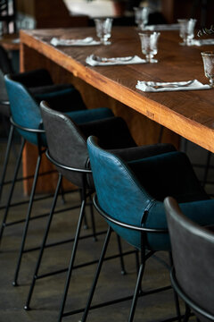 Leather chairs near cafe table