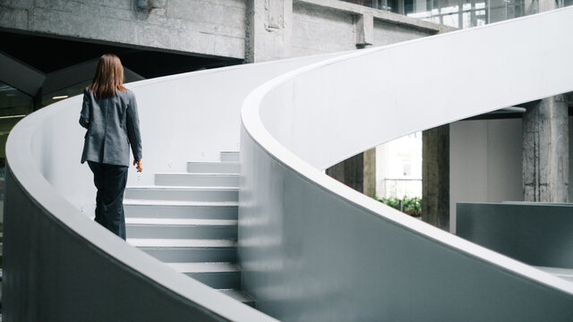 Businesswoman On Office Staircase