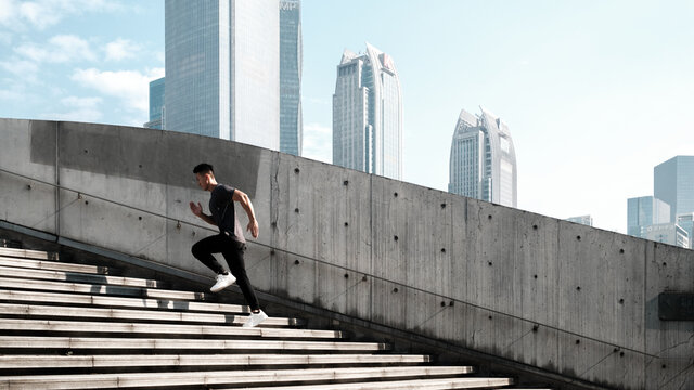 A Chinese man is exercising in the city