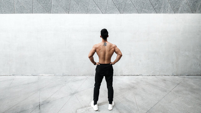 A Chinese man is exercising in the city