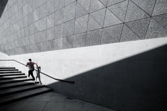 A Chinese man is exercising in the city