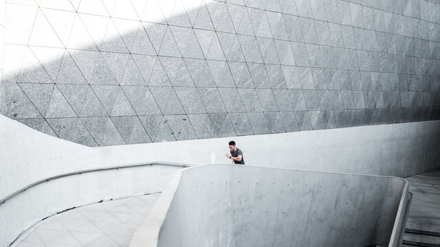 A Chinese man is exercising in the city