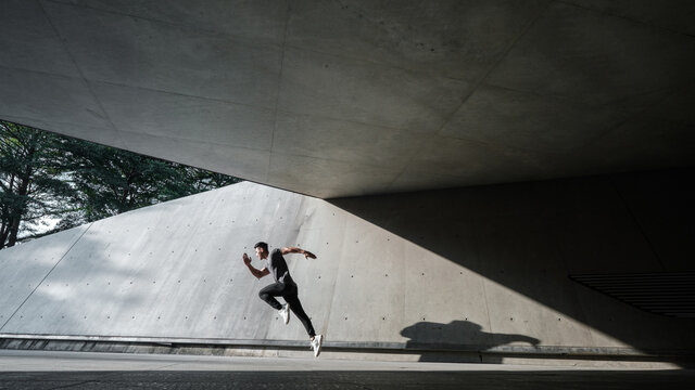 A Chinese man is exercising in the city