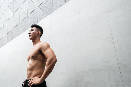 A Chinese man is exercising in the city