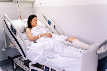 Female Patient In A Hospital.