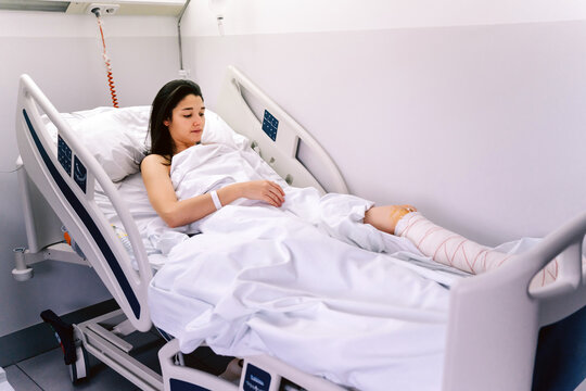 Female Patient In A Hospital.