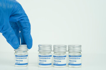 vials with the Covid-19 vaccine on a laboratory bench. to combat the coronavirus  sars-cov-2...