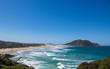 Fototapeta na wymiar baia de Praia tropical, Praia do Santinho, Florianopolis, Santa Catarina, Brasil, Florianópolis,