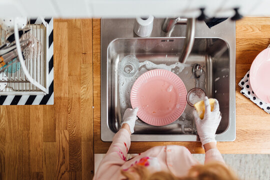 Washing Dishes In The Kitchen