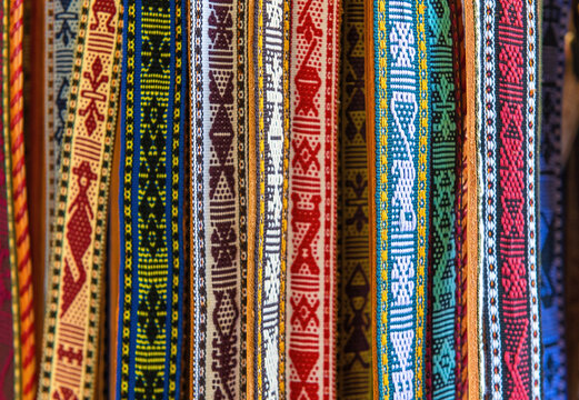 Traditional indigenous fabric belts on a local art and craft market, Santo Tomas Jalieza, Oaxaca state, Mexico. 