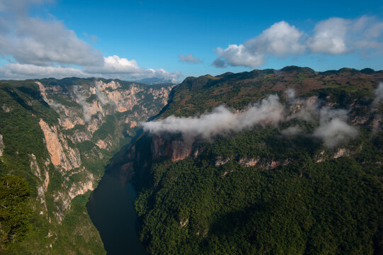 Sumidero canyon, Mexico, shot from the high cliff. Clouds passing by below.
