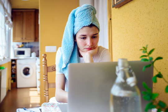 Woman Working From Home With Her Computer.