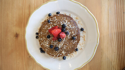 Buckwheat pancakes with berries and coconut  