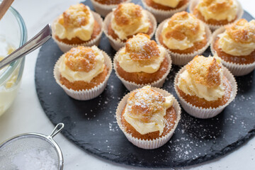 fairy cakes on a slate cake stand 