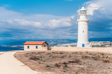 Fototapeta na wymiar Beautiful landscape with big white lighthouse