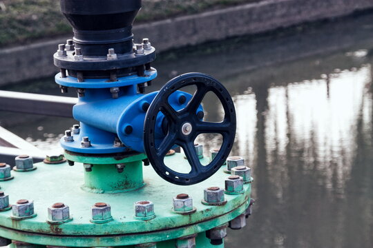 Industrial water tap on the creek damb