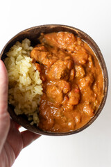 curry in a coconut shell bowl 