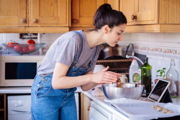 Woman Cooking At Home.