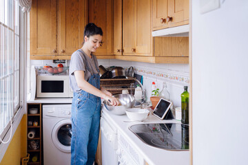 Woman Cooking At Home.