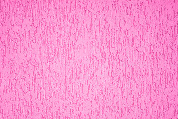 Pink wall, rough plaster, grungy background, pink rough wall, part of a house, part of a building,...
