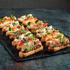 Christmas appetizers on the stone board