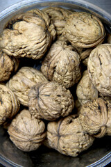 Fototapeta na wymiar Ripe big beautiful group of walnuts
