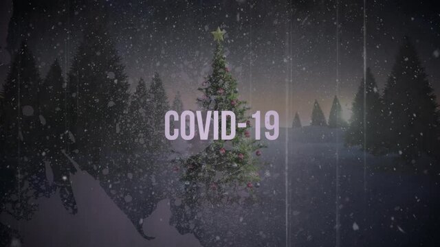 Animation of covid-19 text with christmas tree