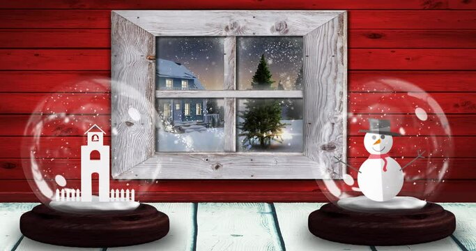 Animation of two snow globes with snowman and church tower with winter scenery seen through window