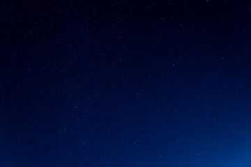 Naklejka na ściany i meble Night sky background with many shining stars, endless space concept.