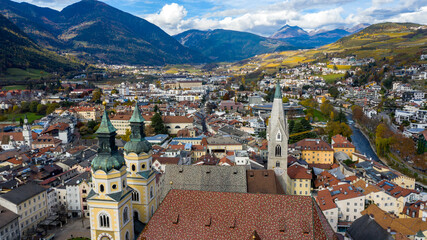 Cathedral of Santa Maria Assunta and San Cassiano in Bressanone. Brixen / Bressanone is a little town in South Tirol in northern Italy. South Tyrol, Bolzano. Italy. Aerial view of the old center city. - obrazy, fototapety, plakaty