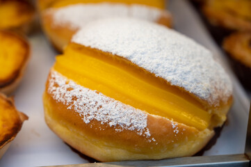 Traditional dessert pastry in Portugal, nata eggs cream cakes with fruits