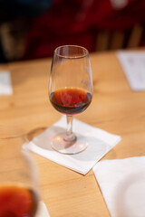Professional tasting of different fortified dessert ruby, tawny port wines in glasses in porto cellars in Vila Nova de Gaia, Portugal