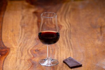 Tasting glass with strong alcoholic spirit drink whisky, cognac, armagnac or calvados