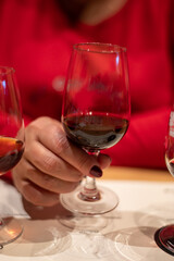 Professional tasting of different fortified dessert ruby, tawny port wines in glasses in porto cellars in Vila Nova de Gaia, Portugal