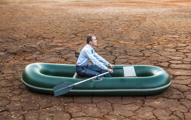 Dumb funny Business man stop on crack soil hot land desert boat businessman rock look bright future...