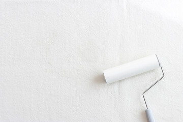 白い絨毯と、粘着カーペットクリーナー白い絨毯と、粘着カーペットクリーナー