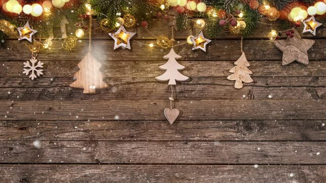 Christmas Still Life with Lights in Wooden Background and Snowflakes Falling. Super Slow Motion Filmed on High Speed Cinema Camera at 1000 fps.