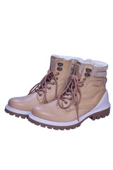 Two beige winter boots stand toes first on a white clipping background.