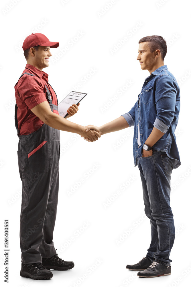 Sticker Full length profile shot of a young man shaking hand with a contractor