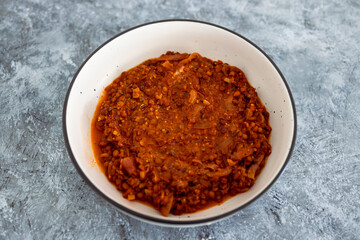 plant-based food,  vegan coconut lentil curry with caramelised onions and mushroom mince