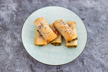 plant-based food, vegan spinace pesto and dairy free cheese pastry rolls