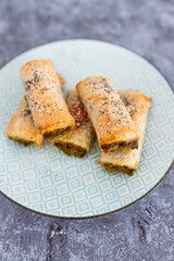 plant-based food, vegan spinace pesto and dairy free cheese pastry rolls
