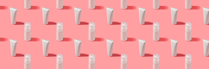 Trendy sunlight beauty pattern made with Blank white tube cream on bright light pink background,...