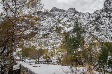 Snowy mountains called Cântaros from where the river Zêzere flows, seen from the valley by the...