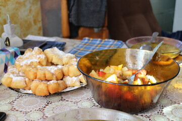 Homemade cakes and fresh vegetable salad